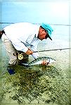 Lefty Kreh with a Bahamas bonefish.Lefty with BonefishJoe Reynolds