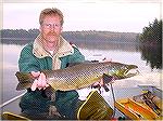 A Maine landlocked salmon shown by fisheries biologist during fall trapnetting. This would have been a beauty on a fly.Maine LandlockedJR