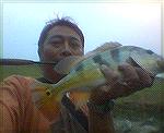 this pic was taken when I was fishing alone and had to take tis pic myself, one hand holding the fish and the other hand holding the camera phone.