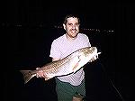 Better Photo of 30 inch Redfish, caught by Dan of Dan''s Custom Flys in St. Petersburg, FL, ate a Dan''s Flippin Shrimp intended for Snook.......DON"T YOU HATE WHEN THAT HAPPENS!!?